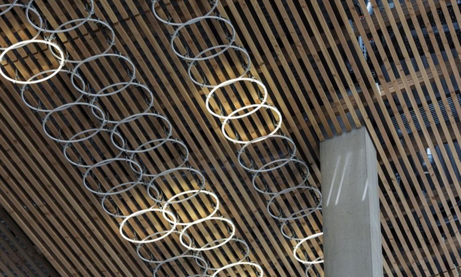 Public pedestrian space at Europaplatz facing the Hans Künzi light installation, clear of station entrances.