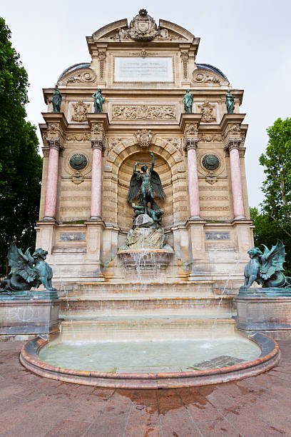 Public square in front of Fontaine Saint-Michel, place Saint-Michel, 75006 Paris. Stand clear of crossings and the basin edge.