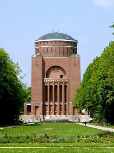 Public path in front of the Planetarium in Stadtpark, clear of the entrance and steps.