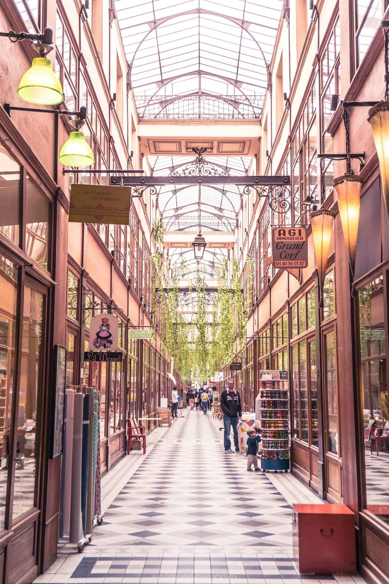 Passage du Grand-Cerf, via 145 rue Saint-Denis, 75002 Paris. Stop to one side inside the open passage beneath the glass roof.