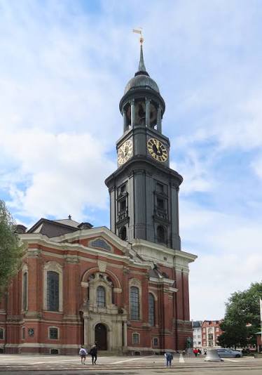 Public forecourt facing the main entrance of St. Michaelis, away from the doorway and worship queues.
